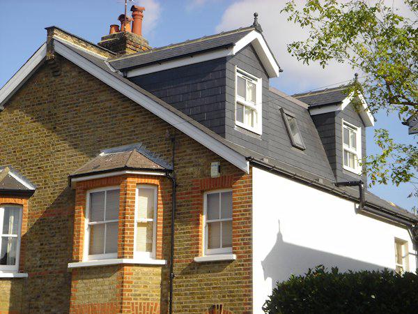 Pitched roof dormers with mansard between